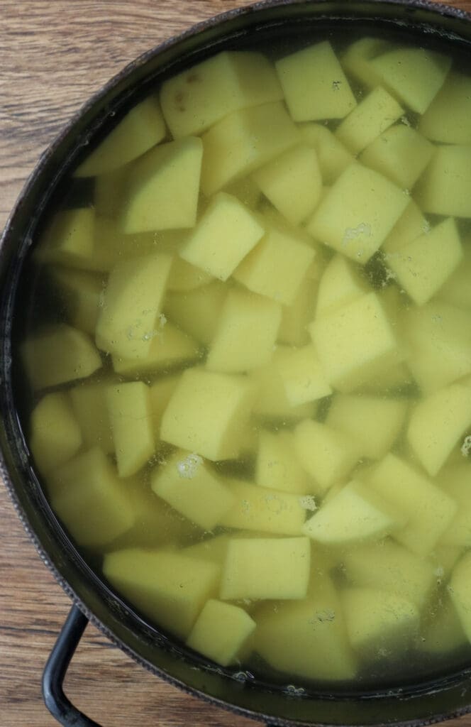 How to cook the potatoes before adding them to the soup